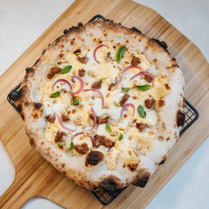 Merguez Sausage, Whipped Apricot Feta and Pickled Onion Pizza
