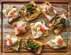 Pizza Crostini with Ricotta and Marinated Broccolini