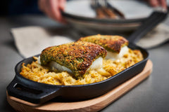 Schlemmerfilet – Herb-crusted cod with creamed Savoy cabbage