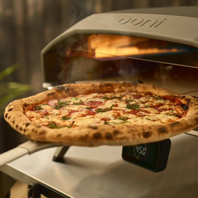 wide 9" pizza turning peel  retrieving pizza from oven 