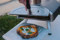 Cooked pizza in an outdoor scene