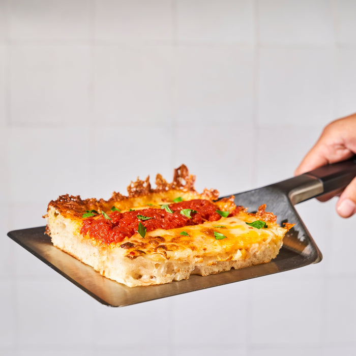 Ooni Pan Pizza Spatula with Detroit-Style Pizza  | Click this image to open up the product gallery modal. The product gallery modal allows the images to be zoomed in on.