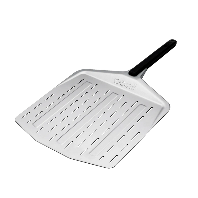 angled view of ooni perforated pizza peel