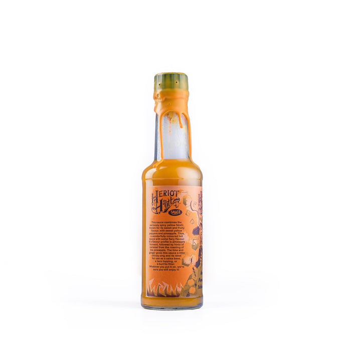 Heriot Hott - Roasted Pineapple and Yellow Fatalli Hot Sauce (150ml) - Ooni United Kingdom | Click this image to open up the product gallery modal. The product gallery modal allows the images to be zoomed in on.