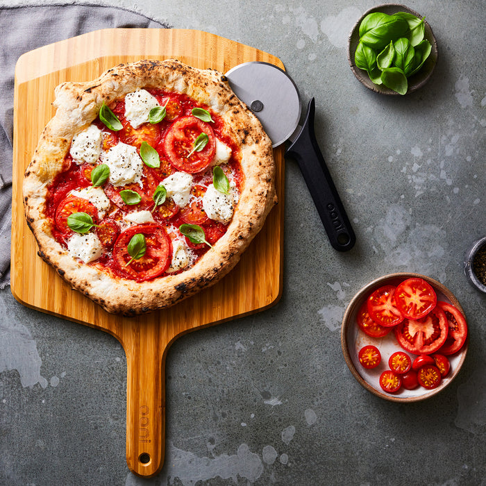 Bamboo Peel and Cutter Peel with Margherita Pizza | Click this image to open up the product gallery modal. The product gallery modal allows the images to be zoomed in on.